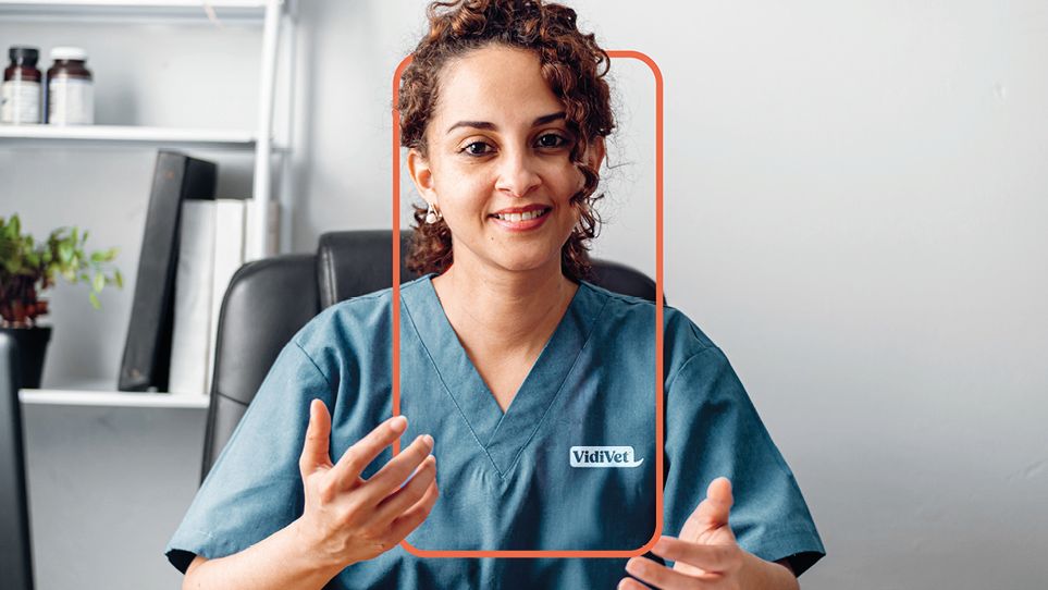 A smiling VidiVet vet